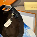 Louis Vuitton cap interior view with black lining and hanging tags, blue outer.