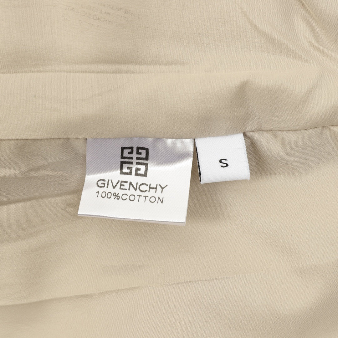 Beige bomber jacket interior label: Givenchy and 100% cotton