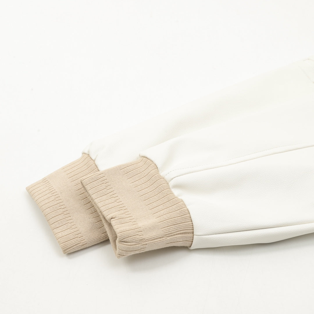 Beige bomber jacket sleeve with ribbed cuff and elastic shoulder trim