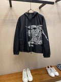 Hooded jacket with black fabric and white graphic print, full zipper front