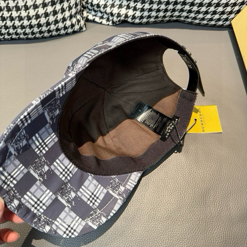Burberry checkered cap interior view with black lining and adjustable fabric strap on brim.