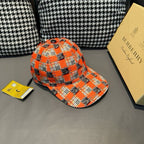 Orange plaid baseball cap featuring dark horse motifs and curved brim