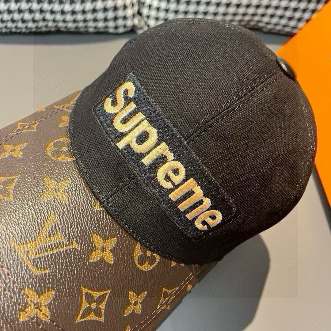 Louis Vuitton x Supreme cap close-up with black patch logo on brown monogram brim