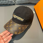 Louis Vuitton x Supreme baseball cap, side profile with black crown and monogram brim