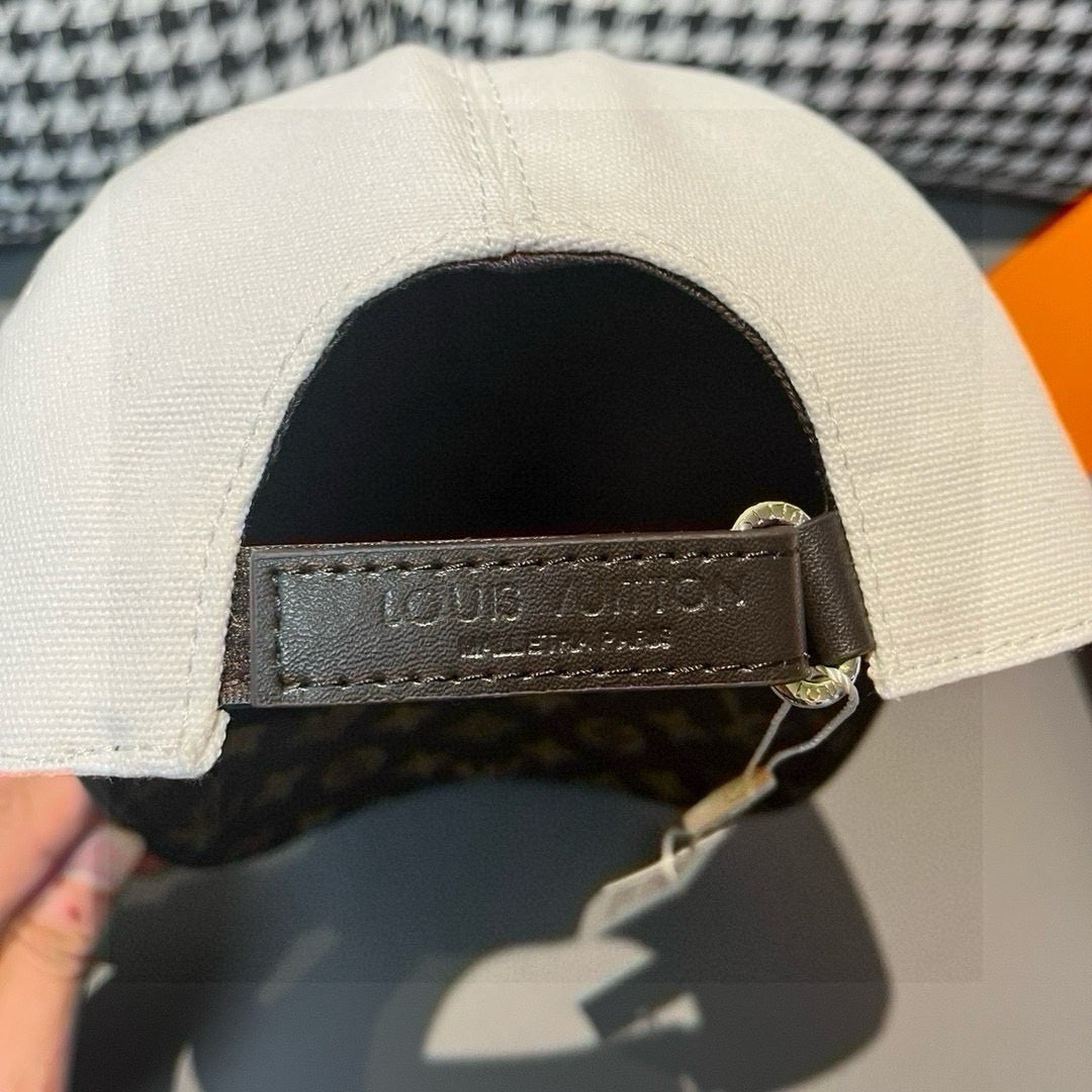 Louis Vuitton cap back panel with adjustable leather strap and stamped details