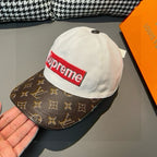 Louis Vuitton cap close-up with white crown and brown monogram brim, Supreme logo