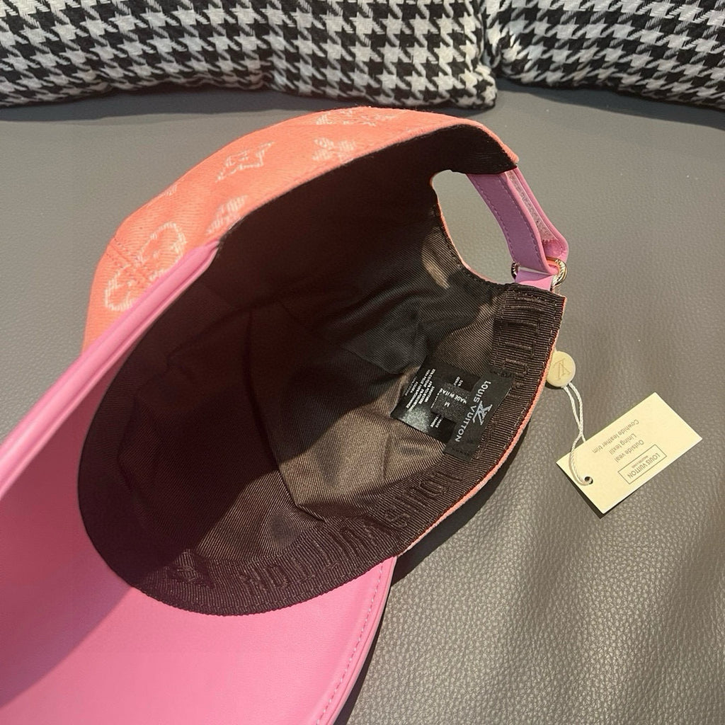 Louis Vuitton monogram cap interior, pink brim and lining with strap and tags.