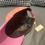 Louis Vuitton monogram cap interior, pink brim and lining with strap and tags.