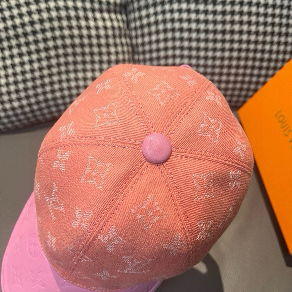 Louis Vuitton monogram baseball cap, peach crown with round button center and stitched panels.