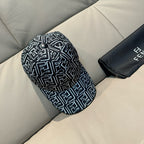Black-and-white patterned cap with curved brim and stitched crown