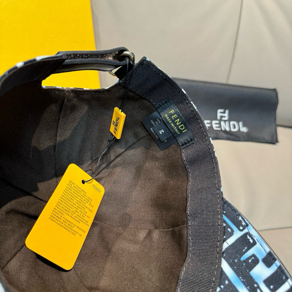 Fendi baseball cap with black strap and fabric tags, black and white-blue FF pattern