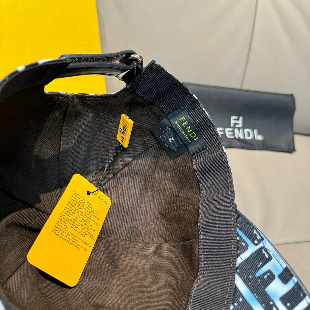 Fendi baseball cap with black strap and fabric tags, black and white-blue FF pattern