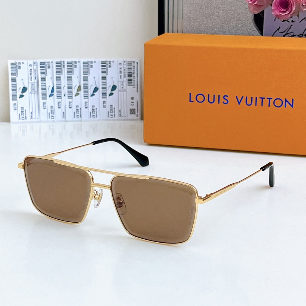 Louis Vuitton sunglasses with gold frame and brown tinted lenses, black temple tips.