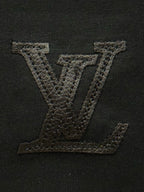 Black T-shirt with large embroidered Louis Vuitton-style LV monogram on chest