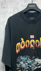 Dark gray crew-neck T-shirt with colorful front lettering graphic and paint-splash print