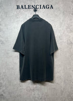 Dark gray crew-neck T-shirt with short sleeves, back view on a hanger