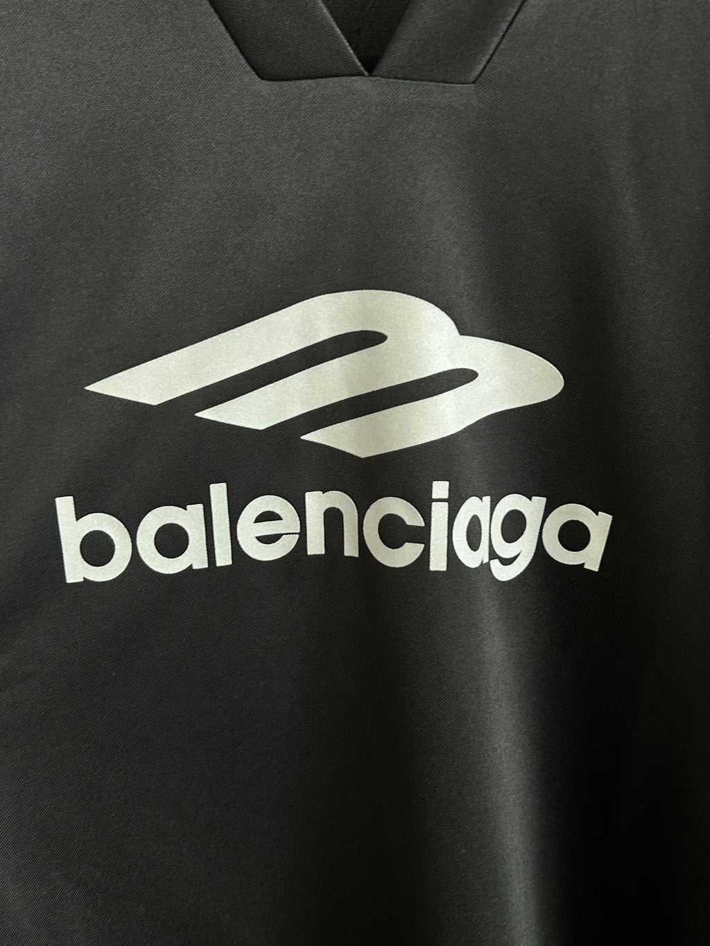 Balenciaga long-sleeve V-neck shirt front with large white balenciaga logo
