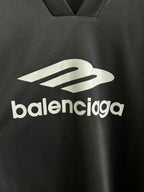 Balenciaga long-sleeve V-neck shirt front with large white balenciaga logo