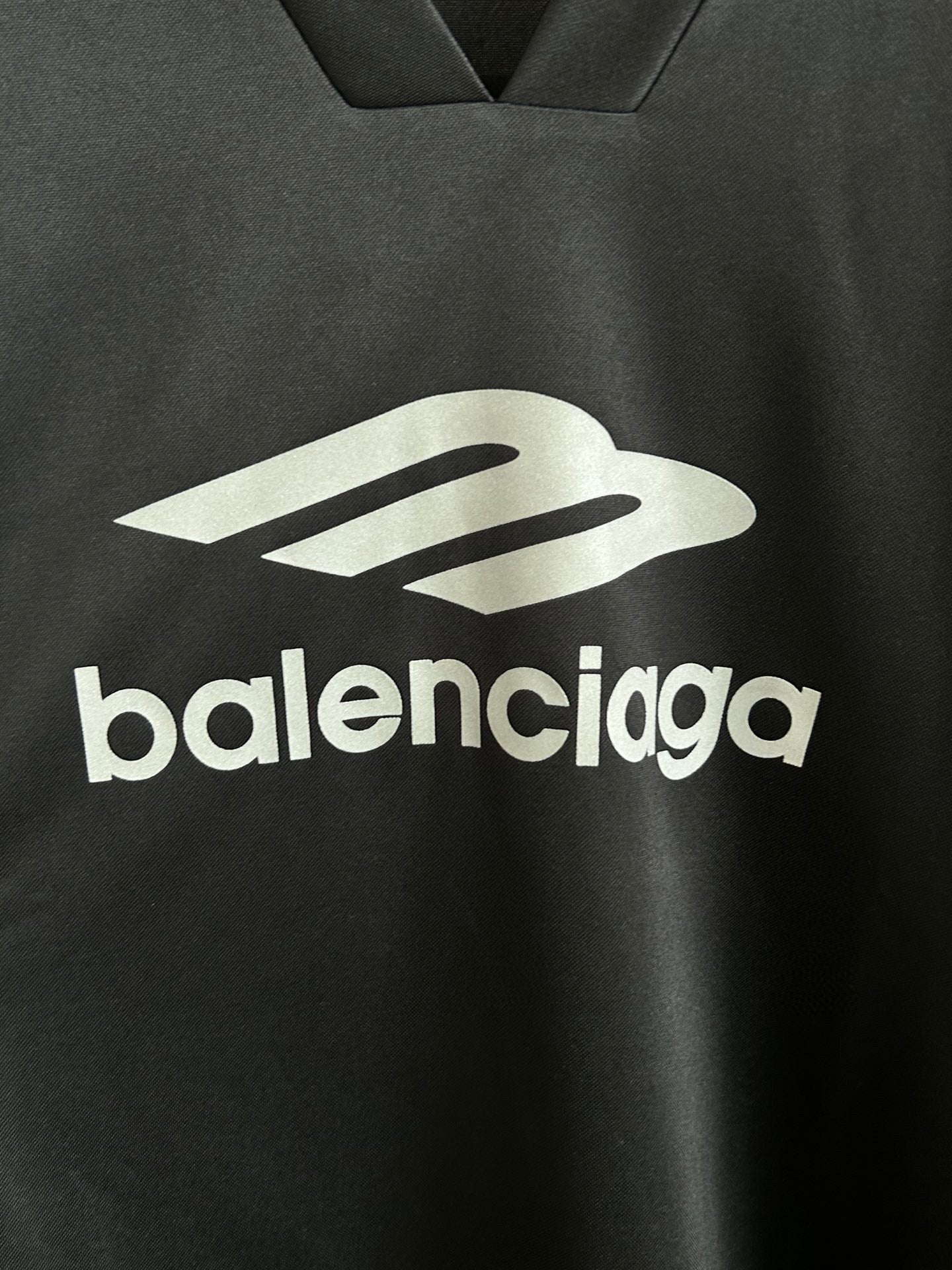 Balenciaga long-sleeve V-neck shirt front with large white balenciaga logo