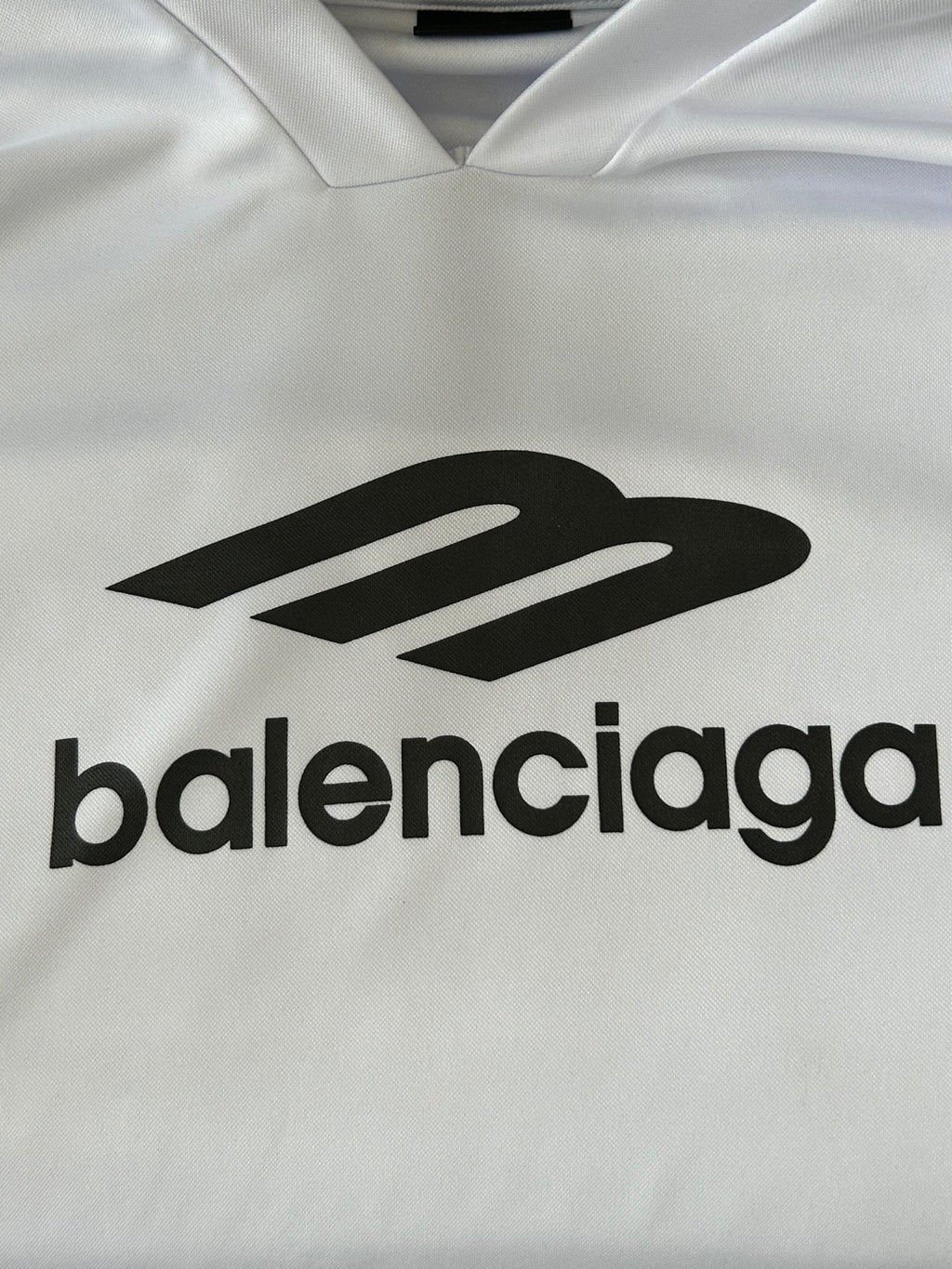 Balenciaga logo print on white long-sleeve top