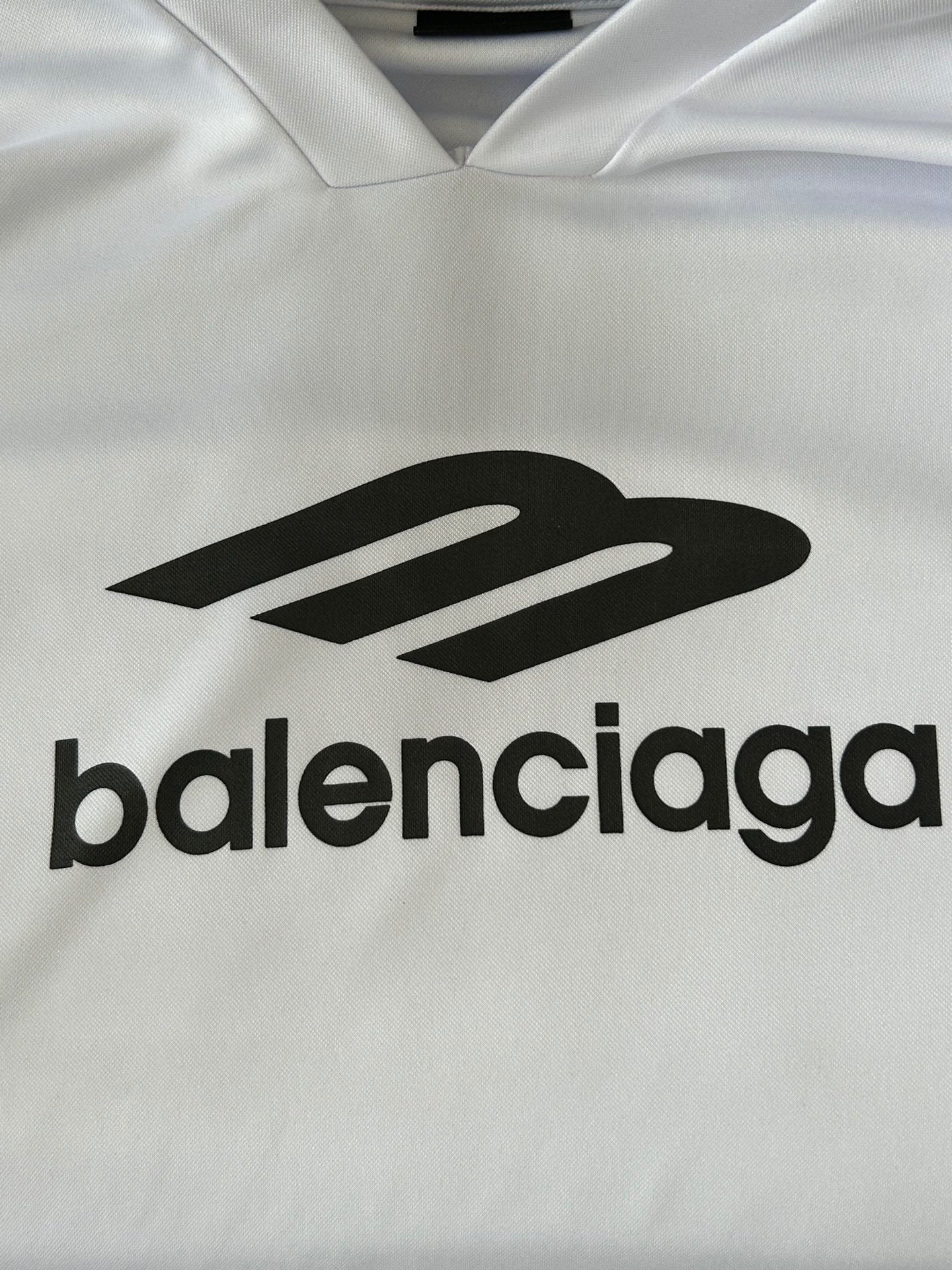 Balenciaga logo print on white long-sleeve top