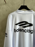 Balenciaga logo on back of white long-sleeve top with black emblem