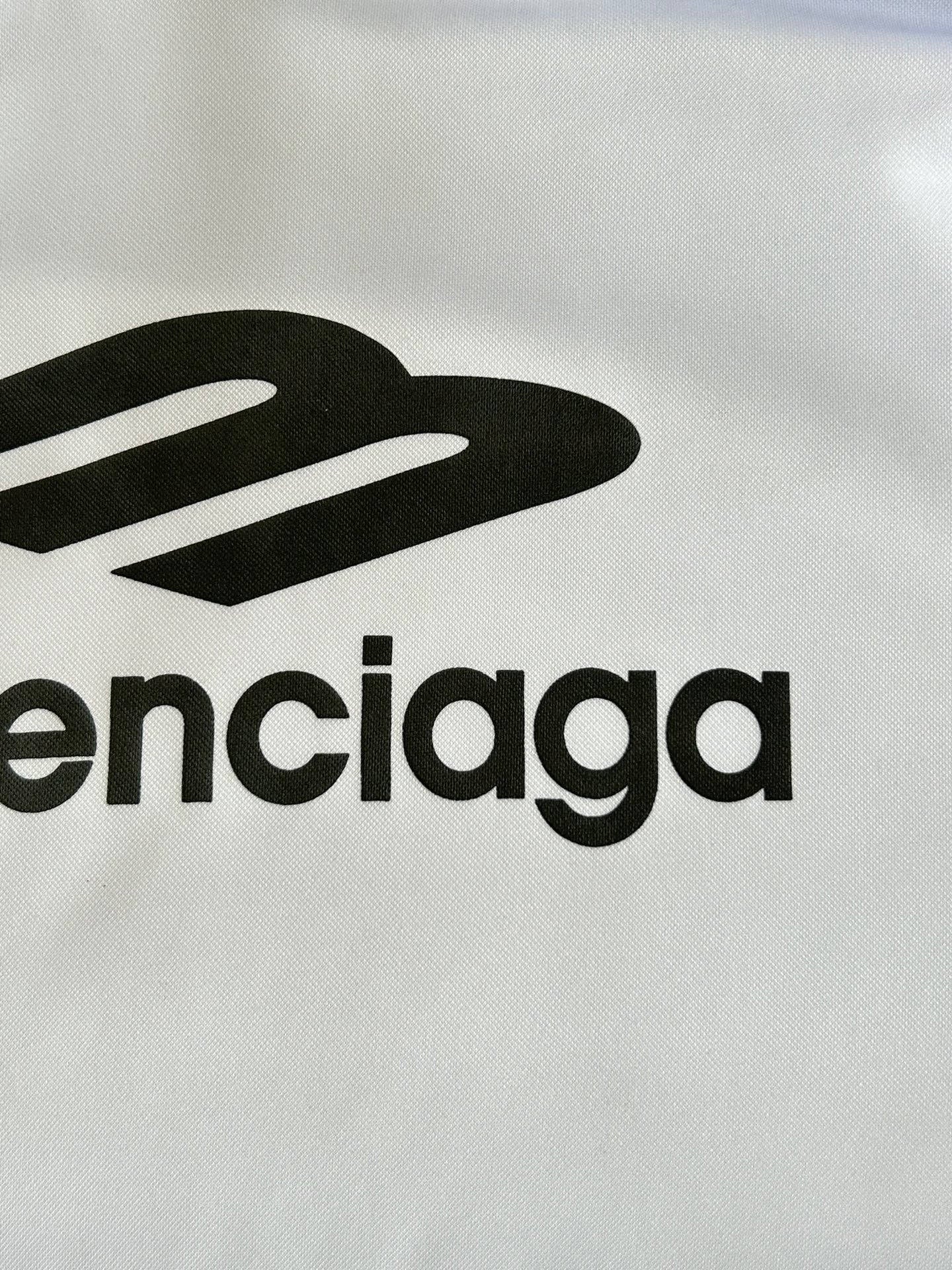 Balenciaga logo text print on white front of long-sleeve top