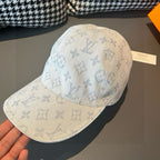 Light beige monogram canvas cap, side view with curved brim