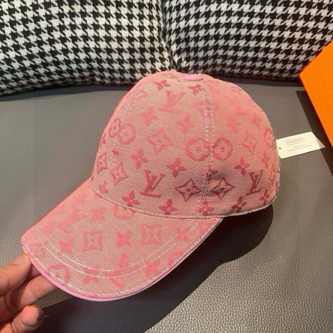 Pink monogram baseball cap, front panel view with Louis Vuitton pattern