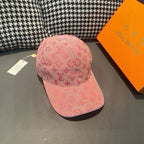 Pink monogram baseball cap with curved brim and front stitching detail