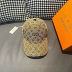 Brown monogram baseball cap with curved brim and small top button detail