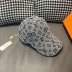 Louis Vuitton cap in light gray with black monogram pattern, front-right view