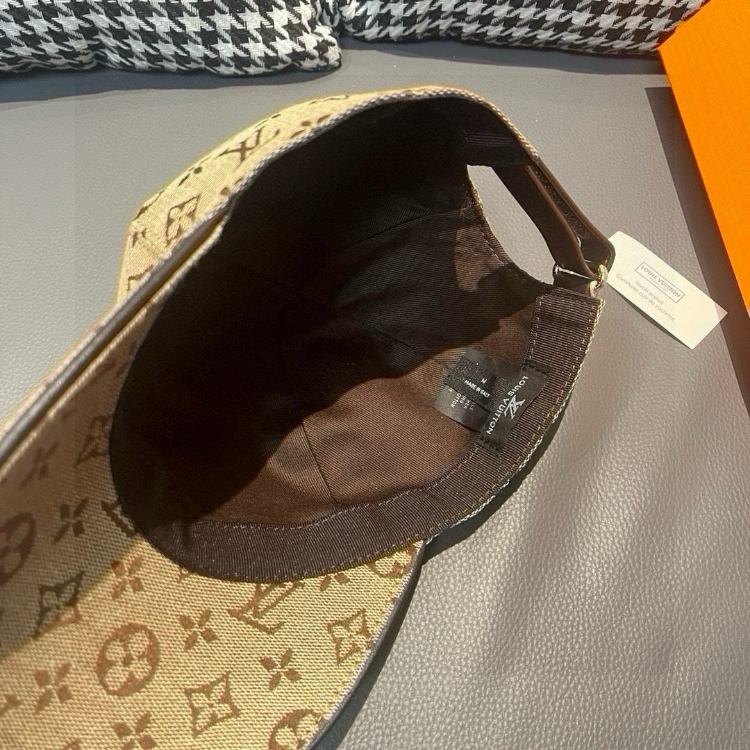 Tan monogram baseball cap interior viewed from the underside of the brim
