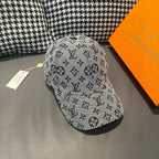 Louis Vuitton cap in light gray with black monogram pattern, side angle
