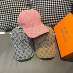 Set of Louis Vuitton caps: light gray, tan, and pink with monogram patterns