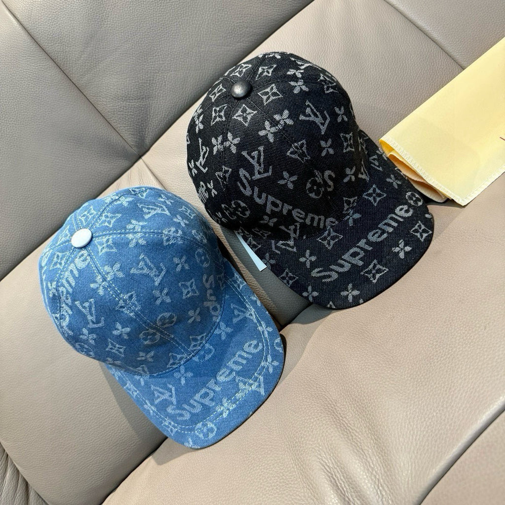 Two caps: black and blue monogram patterns with Supreme text, curved brims.