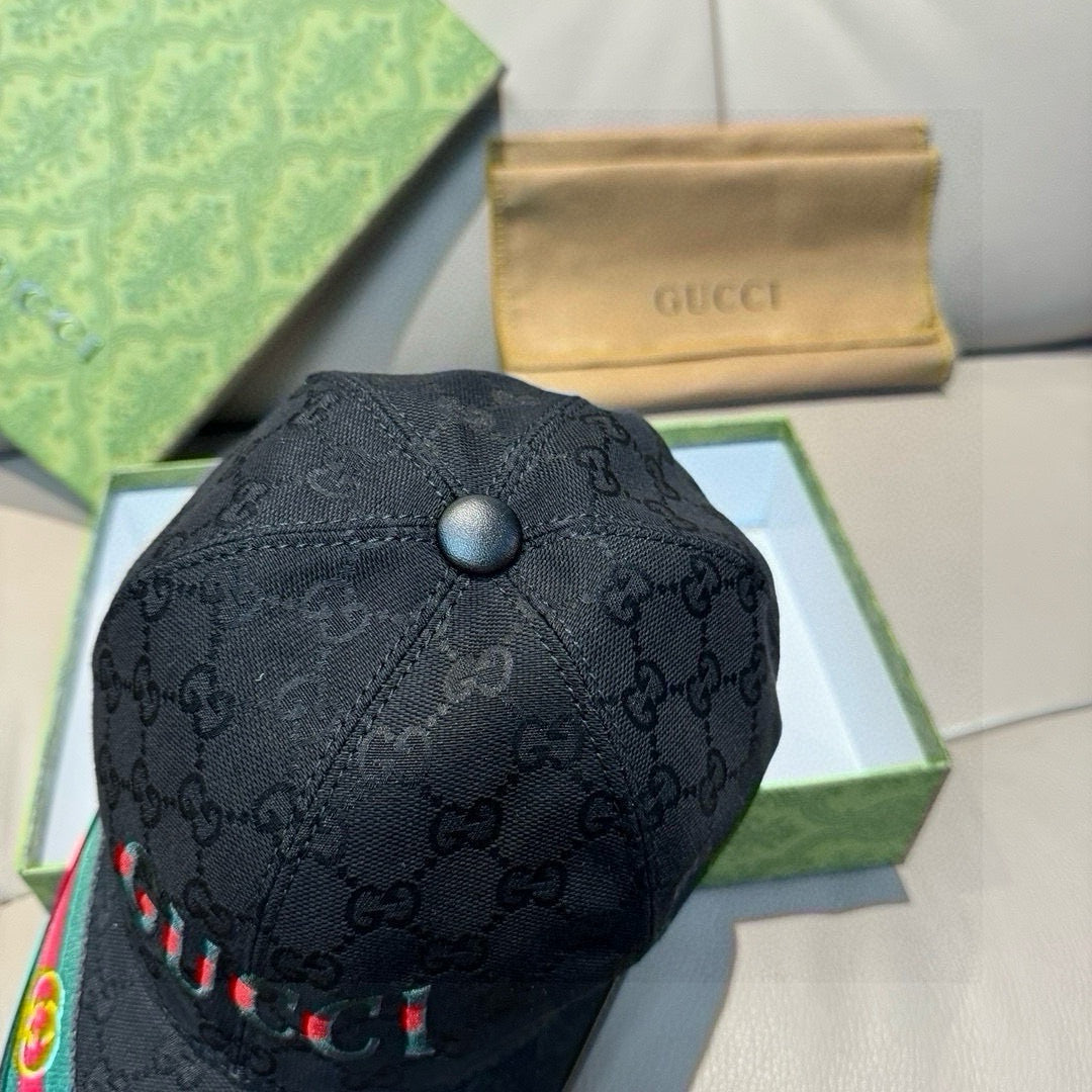 Black Gucci baseball cap with GG monogram pattern and round top button