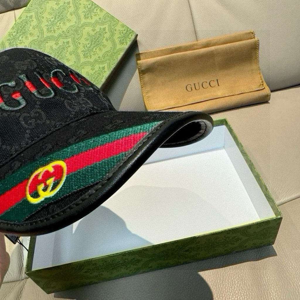 Black Gucci baseball cap with GG monogram and multicolor web stripe detail