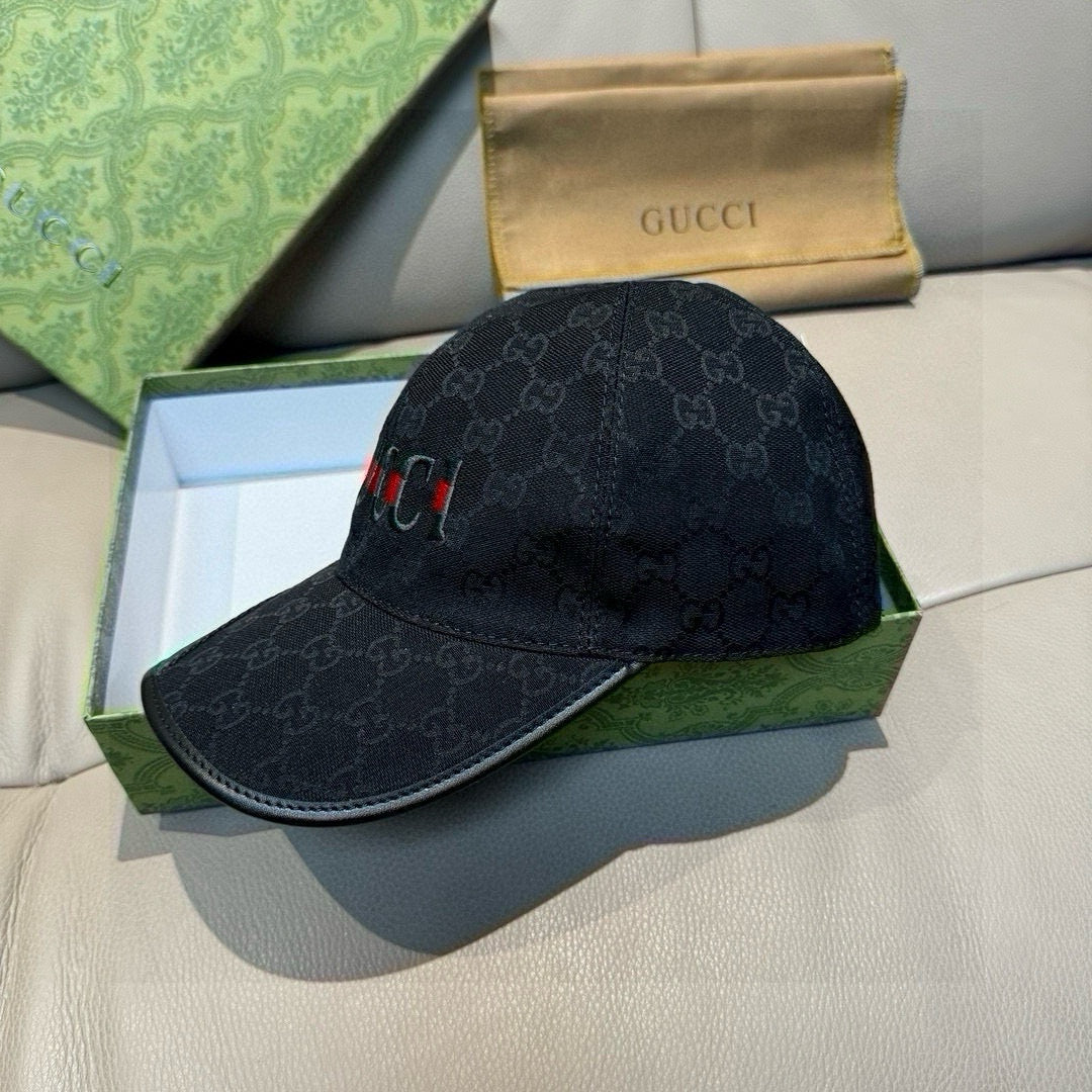 Black Gucci baseball cap with GG monogram pattern and multicolor web stripe