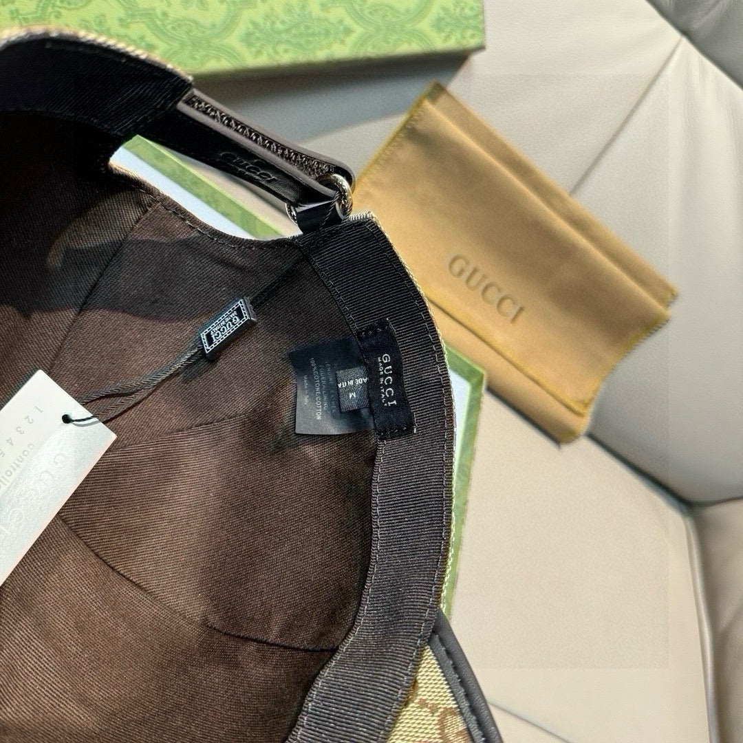 Gucci baseball cap interior, black strap with size tag and Gucci branding label