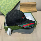 Black Gucci baseball cap with GG monogram and multicolor stripe on brim