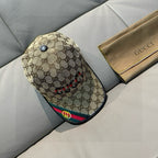 Gucci GG baseball cap angled, beige canvas with center snap button and red-green Web brim