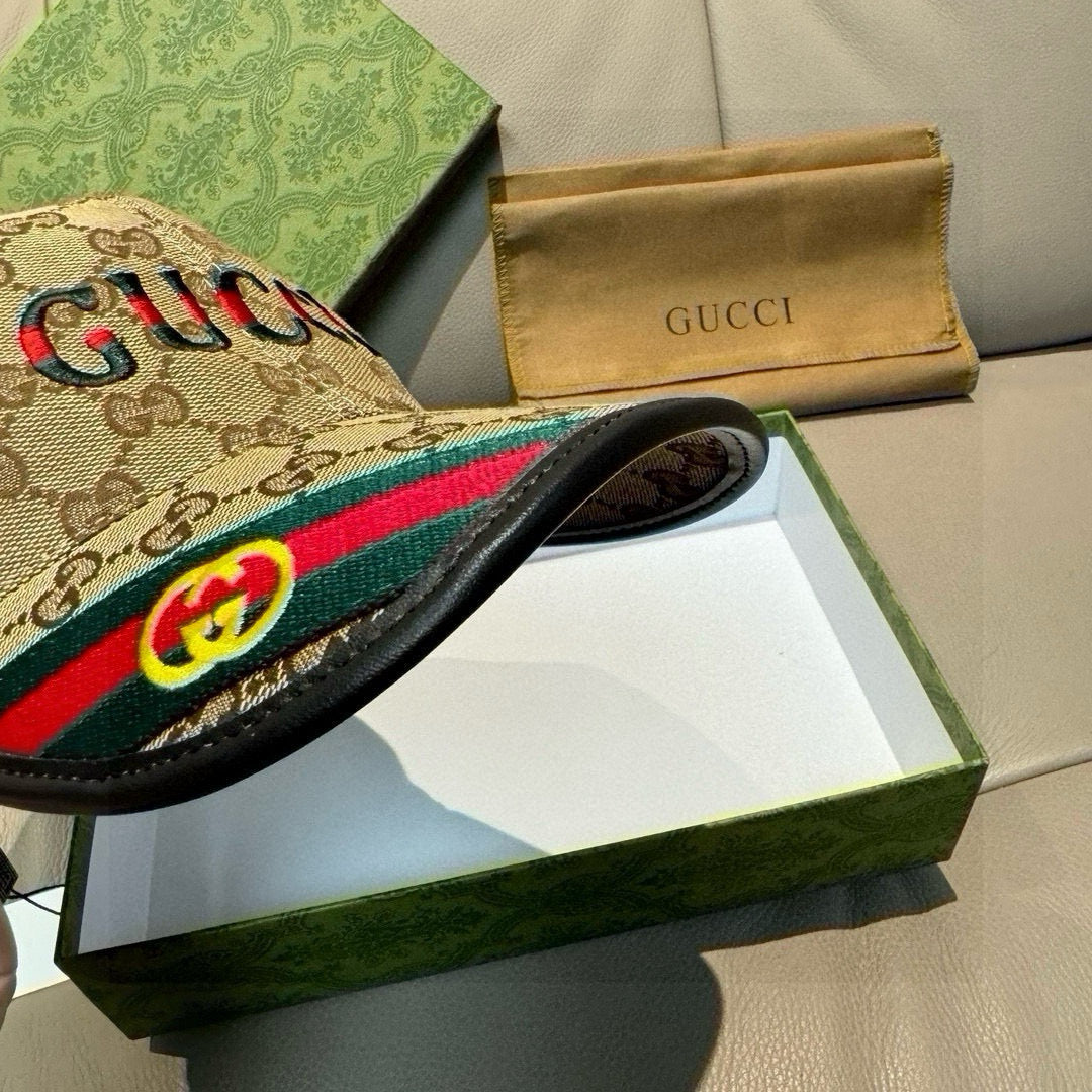 Gucci GG baseball cap close-up, beige canvas with red-green Web band and black edge