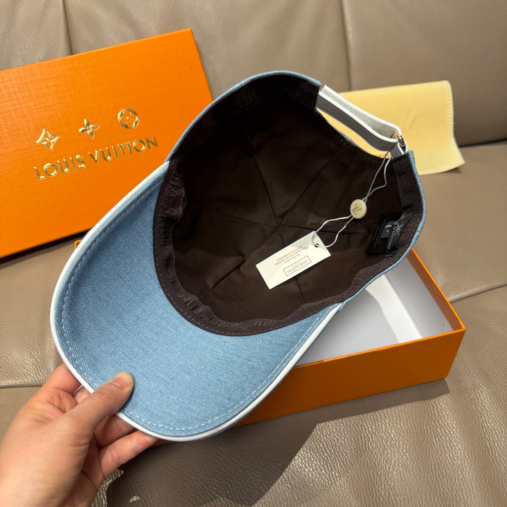Blue denim monogram baseball cap with interior lining and adjustable strap
