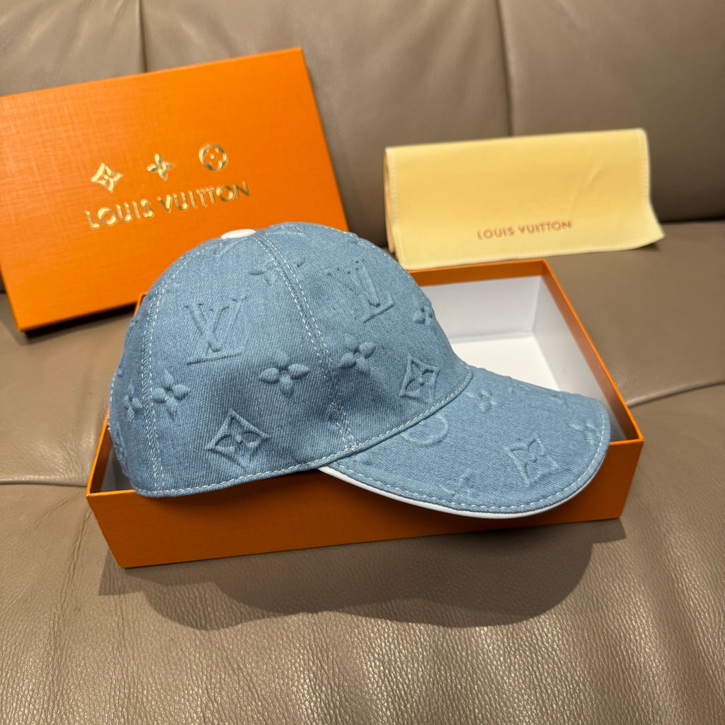 Blue denim monogram baseball cap, front three-quarter view
