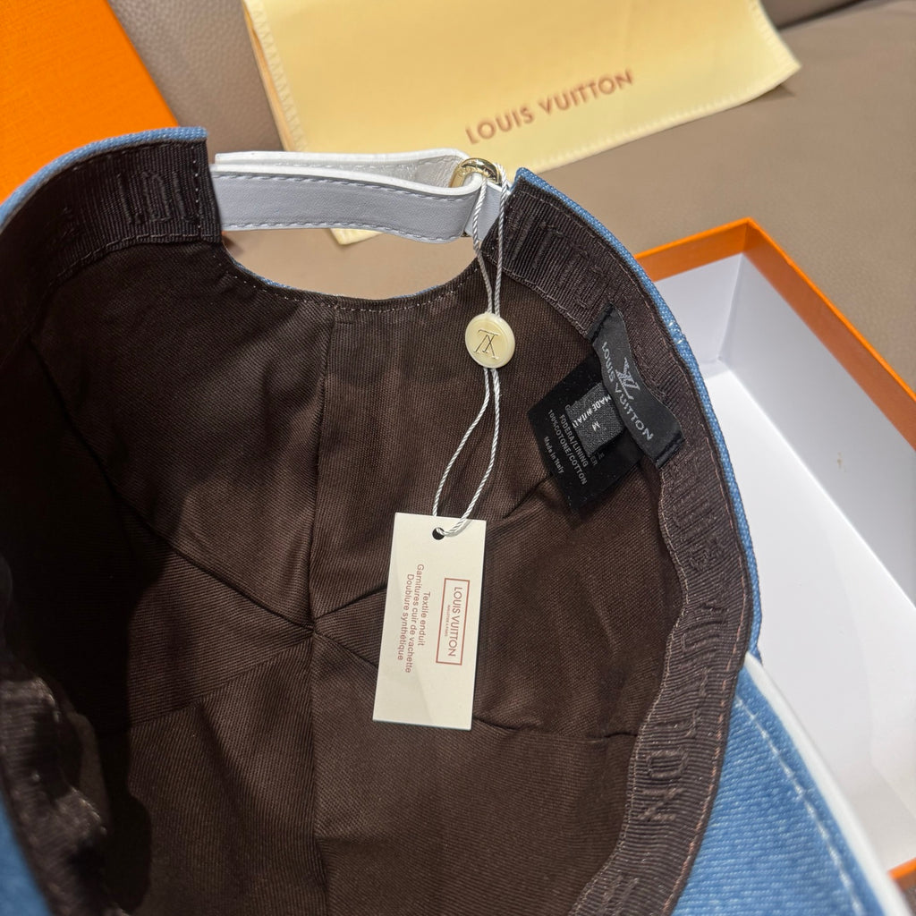 Denim cap interior with dark lining and hanging price tag