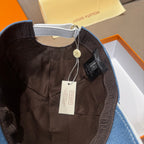 Denim cap interior with dark lining and hanging price tag
