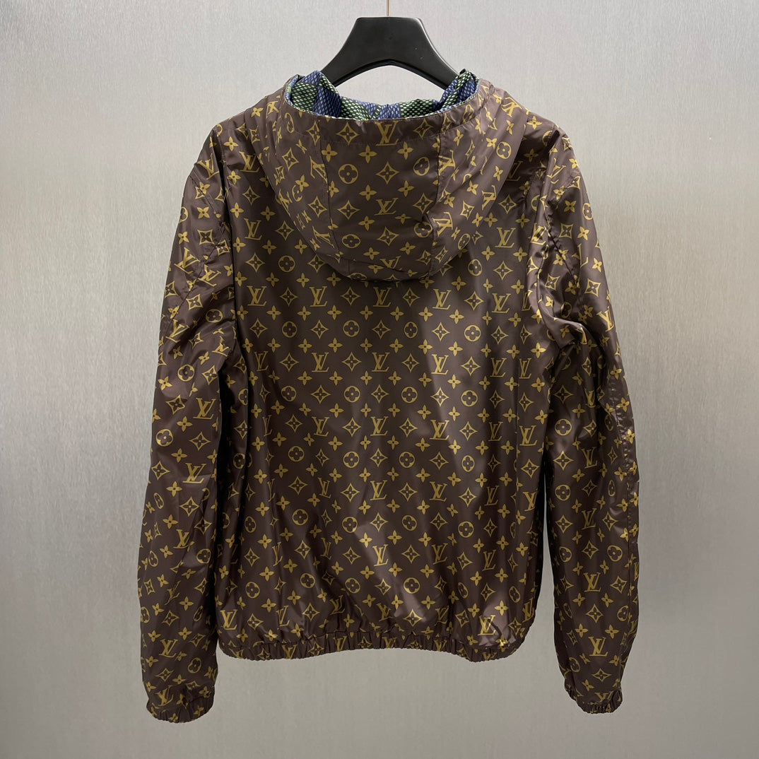 Brown monogram hooded jacket with drawstring cuffs and front zipper