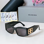 Black square sunglasses with dark lenses and gold EB logo temples