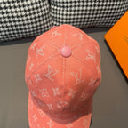 Louis Vuitton monogram cap in coral pink, top button and allover logo pattern